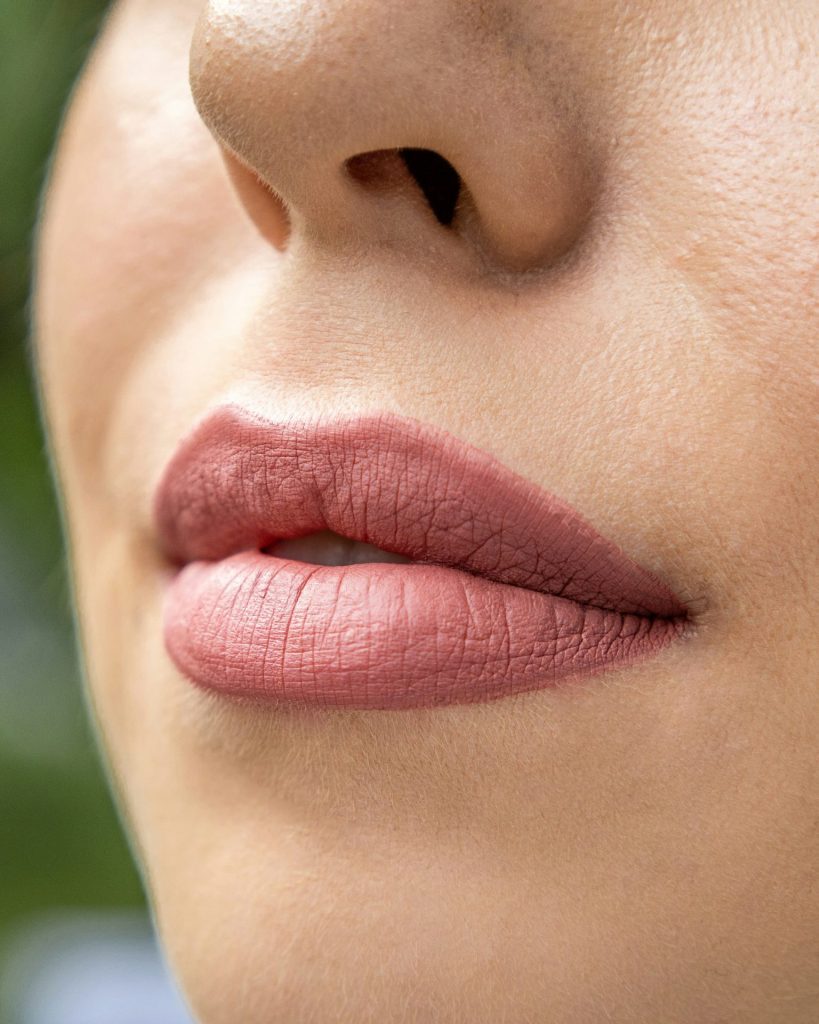 Close-up of natural, fuller-looking lips after permanent lip blush contouring treatment at Organic Beauty by Eve, Garden City, NY